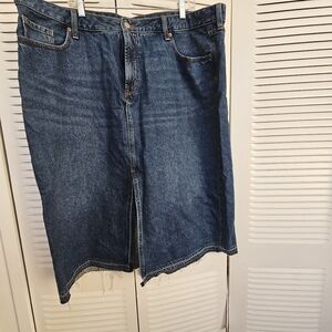 Denim skirt with frayed hem.